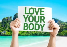 Love Your Body card with a beach on background